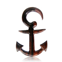 Cargar imagen en el visor de la galería, A hand-carved Piercing Anker Narraholz Plug Ohrstecker Expander with a polished brown finish and anchor design, large top loop, pointed flukes, and barbed arms, shown on a white background.
