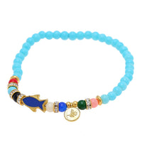 Load image into Gallery viewer, Armband Brass golden Fisch blau bunt Zirkonia Ringe Plättchen verstellbar
