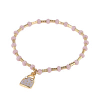 Cargar imagen en el visor de la galería, Armband Brass Steine goldfarben Perlen rosa Anhänger Handtasche
