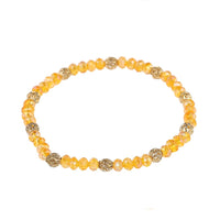 Load image into Gallery viewer, Armband Perlen facettiert orange schimmernd Brass Kugel verstellbar
