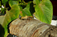 Load image into Gallery viewer, Messing Armreif golden Tigerauge rund acht Zopfrand nickelfrei verstellbar antik Tribal Schmuck
