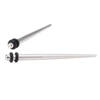 Load image into Gallery viewer, Piercing Spike Expander Edelstahl silbern Ohrstecker zwei Gummiringe schwarz
