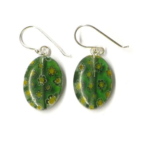A pair of green oval Muranoglas earrings with floral pattern discs and 925 sterling silver hooks.