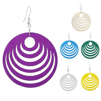 Cargar imagen en el visor de la galería, Five round, colorful Holzohrringe (50 mm) with curved cutout patterns in purple, white, blue, green, silver, and yellow are displayed on white. On the left is a large, nickelfree purple earring from the &quot;Holzohrringe bunt 50 mm rund Halbkreise Damen Ohrringe Holz Ohrhänger Organic.
