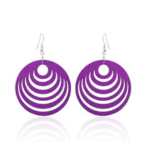 Cargar imagen en el visor de la galería, A pair of colorful, round 50 mm wooden earrings (Holzohrringe bunt) with semicircle designs and nickelfrei hooks, displayed against a white background.
