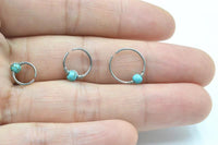 Load image into Gallery viewer, Universal Piercing Ring Edelstahl Türkis Perle 0.8mm
