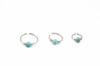 Load image into Gallery viewer, Universal Piercing Ring Edelstahl Türkis Perle 0.8mm
