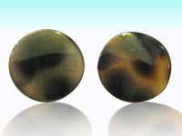 Load image into Gallery viewer, A pair of Muschel 925 Silber Ohrstecker, round and colored brown and white, displayed against a gradient light blue and white background.
