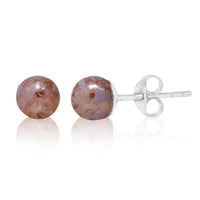 Load image into Gallery viewer, A pair of metallic pink pearl Perlenohrstecker featuring floral designs, set on 925er Silber studs for women, displayed against a white background.
