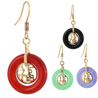 Load image into Gallery viewer, Four Brass Ohrringe Ohrhänger Damen with circular hoops in red, black, green, and purple, each with a gold hook and dangling Katzenauge rund cut-out charm.
