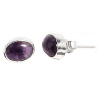 Cargar imagen en el visor de la galería, A pair of Silberohrstecker oval Ohrringe for Damen, crafted from 925er Sterling Silber with polished purple Edelstein. One earring is shown from the front, the other angled to display the side and post.
