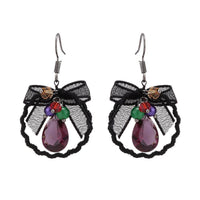 Load image into Gallery viewer, Brass Ohrringe silberfarben welliger Kreis Stoff schwarz bunte Steine - chic - net.de
