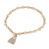 Cargar imagen en el visor de la galería, Armband Brass Steine goldfarben Perlen braun creme Anhänger Handtasche - chic-net.de
