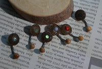 Load image into Gallery viewer, Bauchnabel Piercing Edelstahl Olivenholz 1.6x9.5 Blume - chic-net.de
