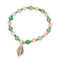 Cargar imagen en el visor de la galería, Brass Armband golden Stein grün Perlen Kristalle Blatt Charm verstellbar facettiert - chic-net.de
