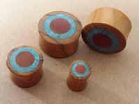 Load image into Gallery viewer, Flesh Plug Ringe Sawoholz crushed Türkis Teakholz Holz - chic-net.de
