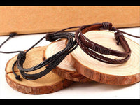 Load image into Gallery viewer, Leder Armband mehrreihig geflochten umwickelt verstellbar - chic-net.de
