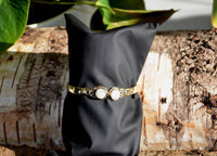 Load image into Gallery viewer, Messing Armreif golden Mondstein rund acht Zopfrand nickelfrei verstellbar antik Tribal Schmuck.
