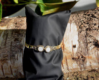 Load image into Gallery viewer, Messing Armreif golden Mondstein rund acht Zopfrand nickelfrei verstellbar antik Tribal Schmuck.
