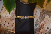 Load image into Gallery viewer, Messing Armreif golden Mondstein Spirale Tropfen Flechtrand nickelfrei verstellbar antik Tribal - chic-net.de
