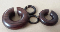 Load image into Gallery viewer, Piercing Narraholz Holz Expander dunkelbraun groß Ohrstecker Ring Bogen Dehner - chic-net.de
