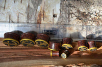Load image into Gallery viewer, Plug Holz Tamarinde dunkelbraun Anker Seil Brass Überzug golden Rand Piercing - chic-net.de
