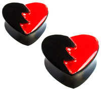 Load image into Gallery viewer, Two glossy, heart-shaped Plug Herz gebrochen schwarz rot Holz broken Heart pieces, half black and half red with a jagged line, resemble a broken heart—perfect for a bold, unique accessory statement.
