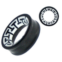 Cargar imagen en el visor de la galería, The Tribal Holz Tunnel is a black ironwood ring with a hand-carved white bone inlay, featuring a repeating black geometric pattern inspired by tribal designs. Shown from the side and top to highlight its unique motif.
